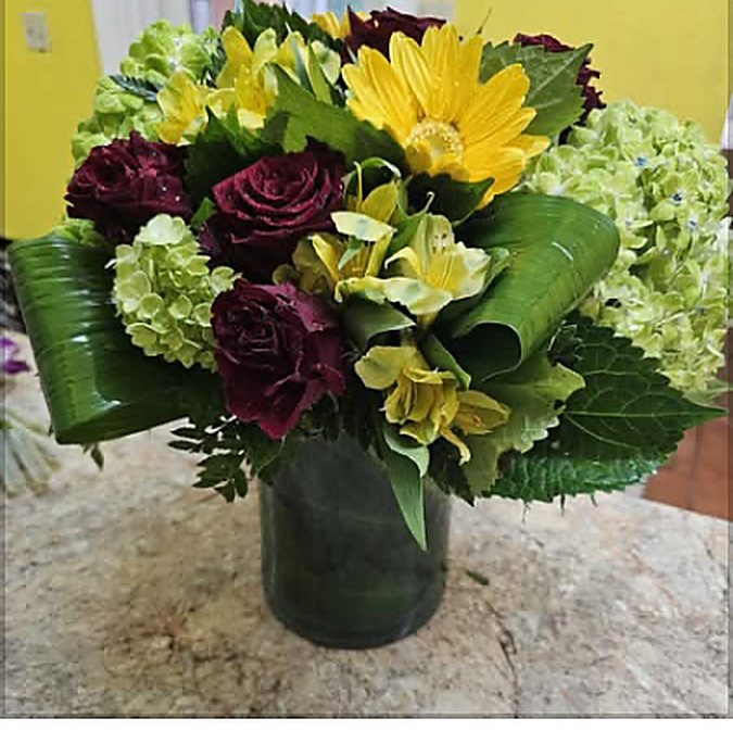 Green hydrangea with burgundy roses